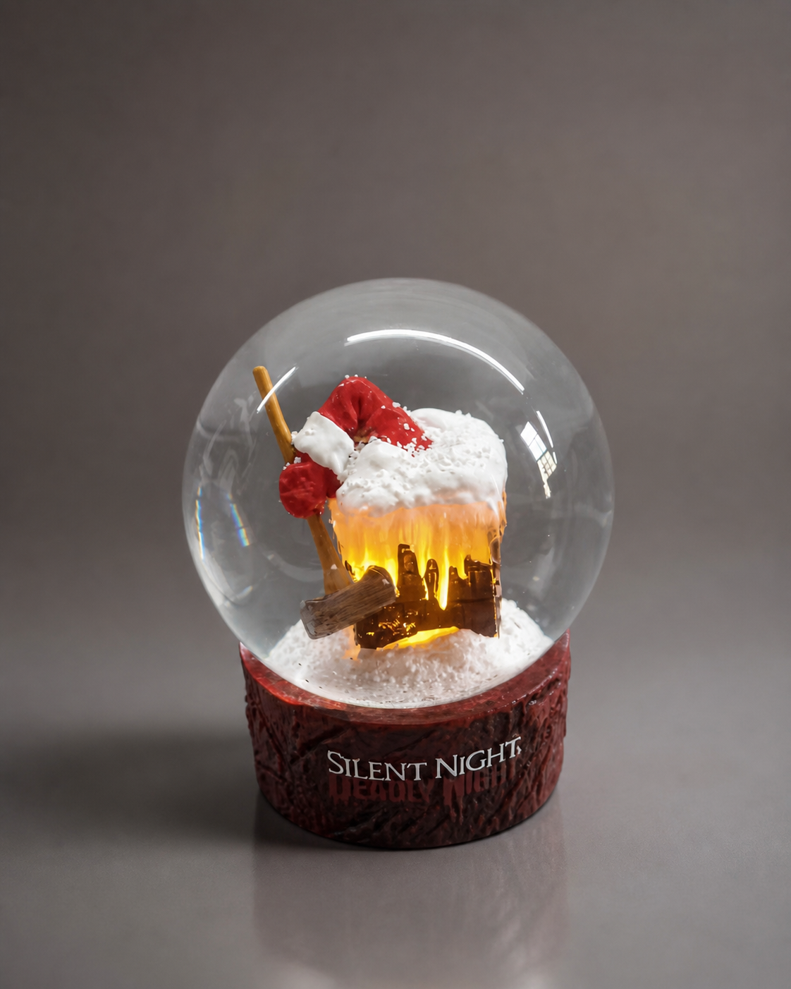Custom snow globe featuring miniature ancient ruins with classical sculptural detail inside a clear dome