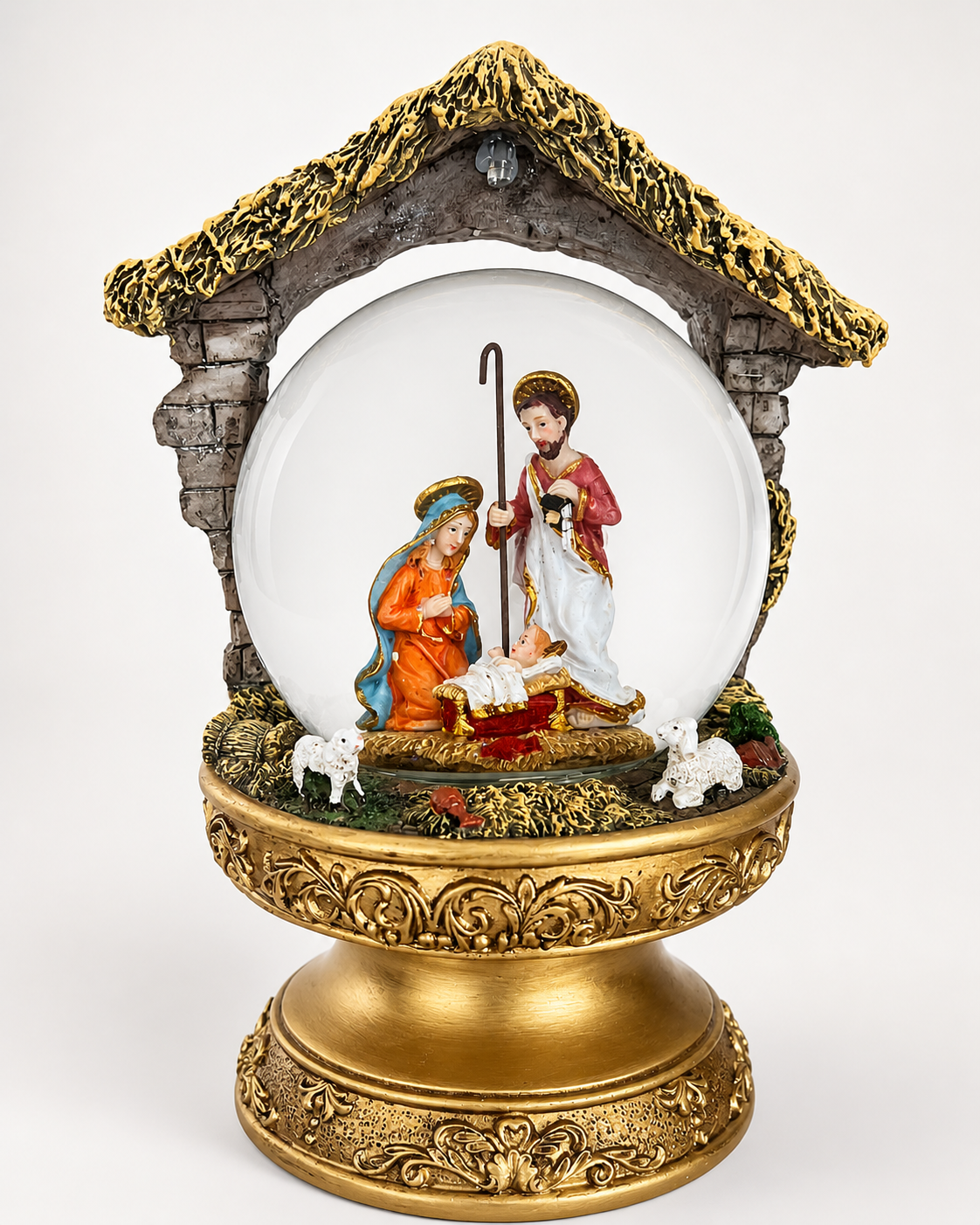 Custom snow globe featuring a nativity scene inside a classical stone building with architectural detail