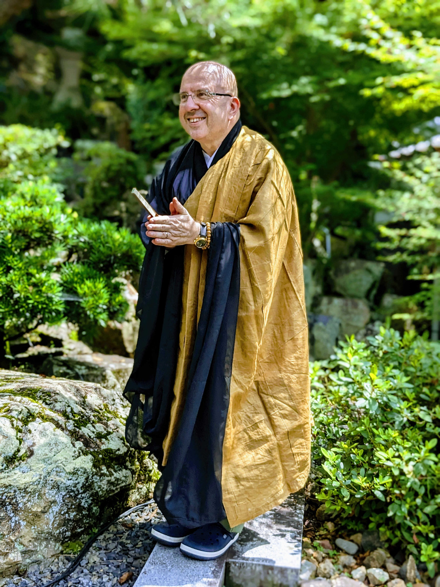Pierre wearing a kesa garb