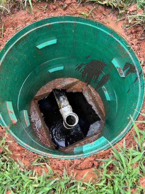 Green septic riser installed on a septic tank in Rock Hill SC showing improved ground-level access