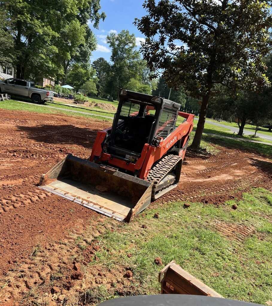 Kubota skid steer grading and leveling property in Rock Hill SC