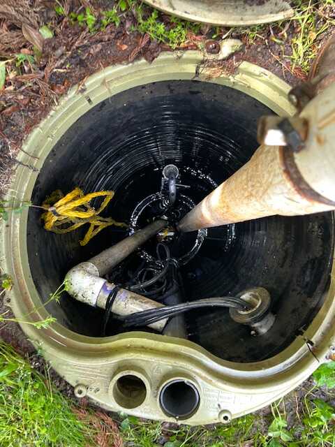 Close-up view inside a septic tank being pumped by DLC Septic in Rock Hill SC