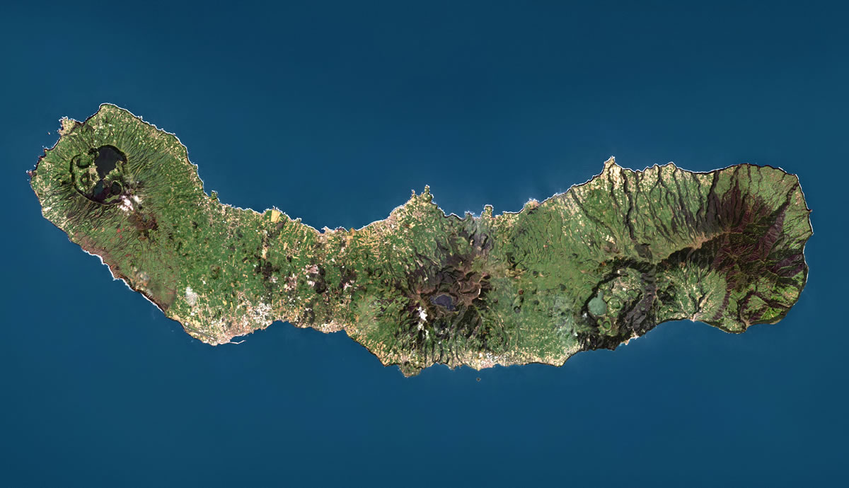 Aerial view of São Miguel island, Azores — twin volcanic lakes and Atlantic coastline