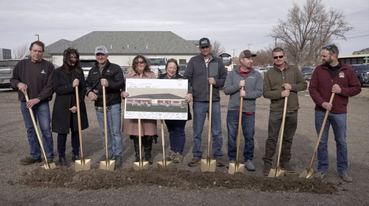Groundbreaking ceremony team with golden shovels