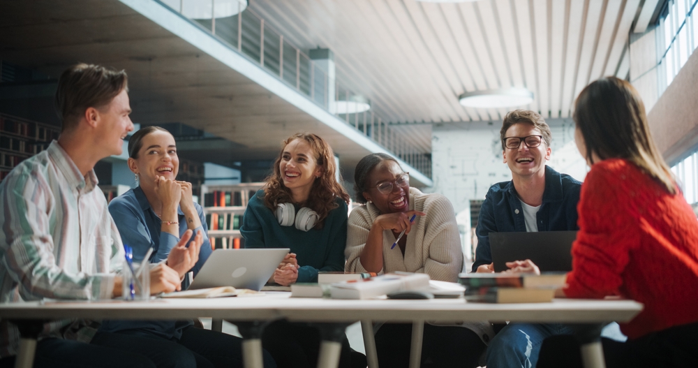 Brightversity students collaborating in a modern library