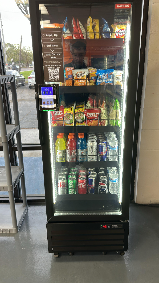 HaHa vending machine by SkySnackDrop Co LLC stocked with snacks and beverages