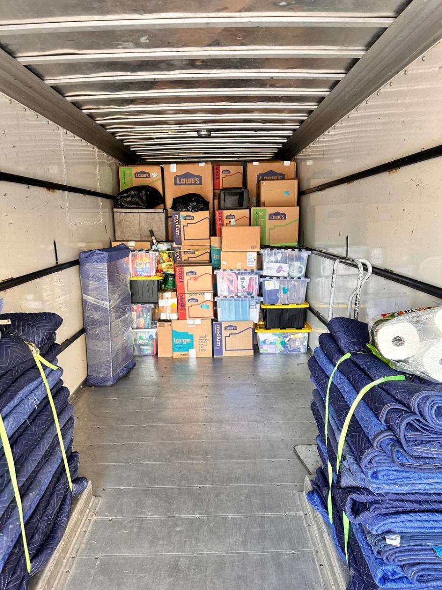 Precision Moving Co truck loaded with moving blankets and boxes ready for delivery in Central Virginia