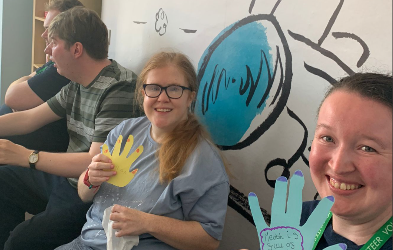 Participants learning cooking skills