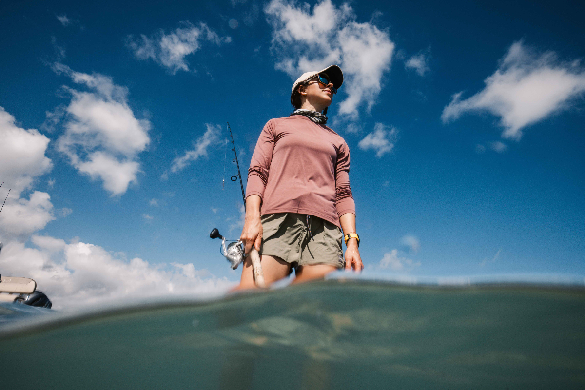 Allie fishing on the boat in Florida coastal waters
