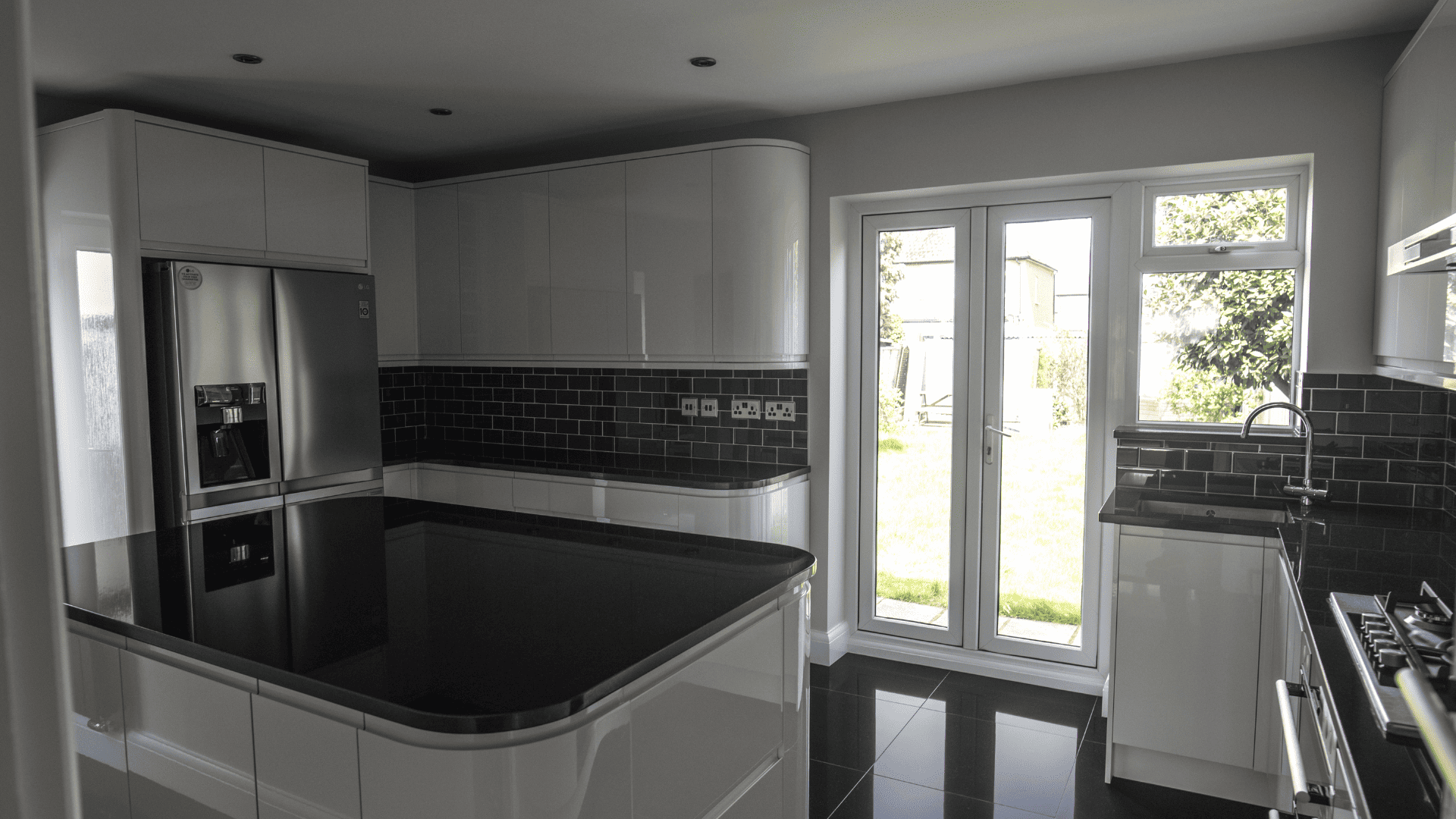 Kitchen with island installation in Claygate
