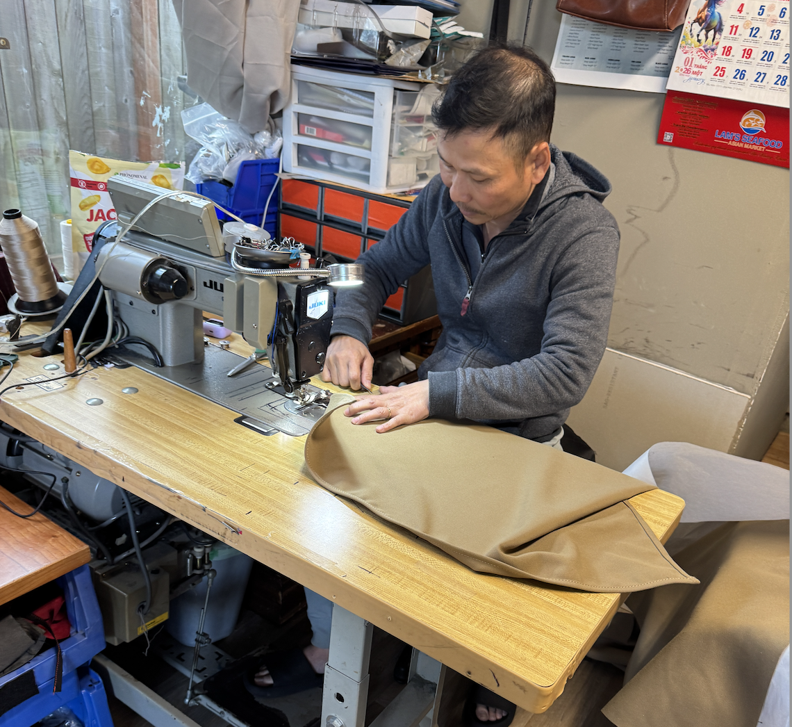 Colorful thread spools and fabric materials