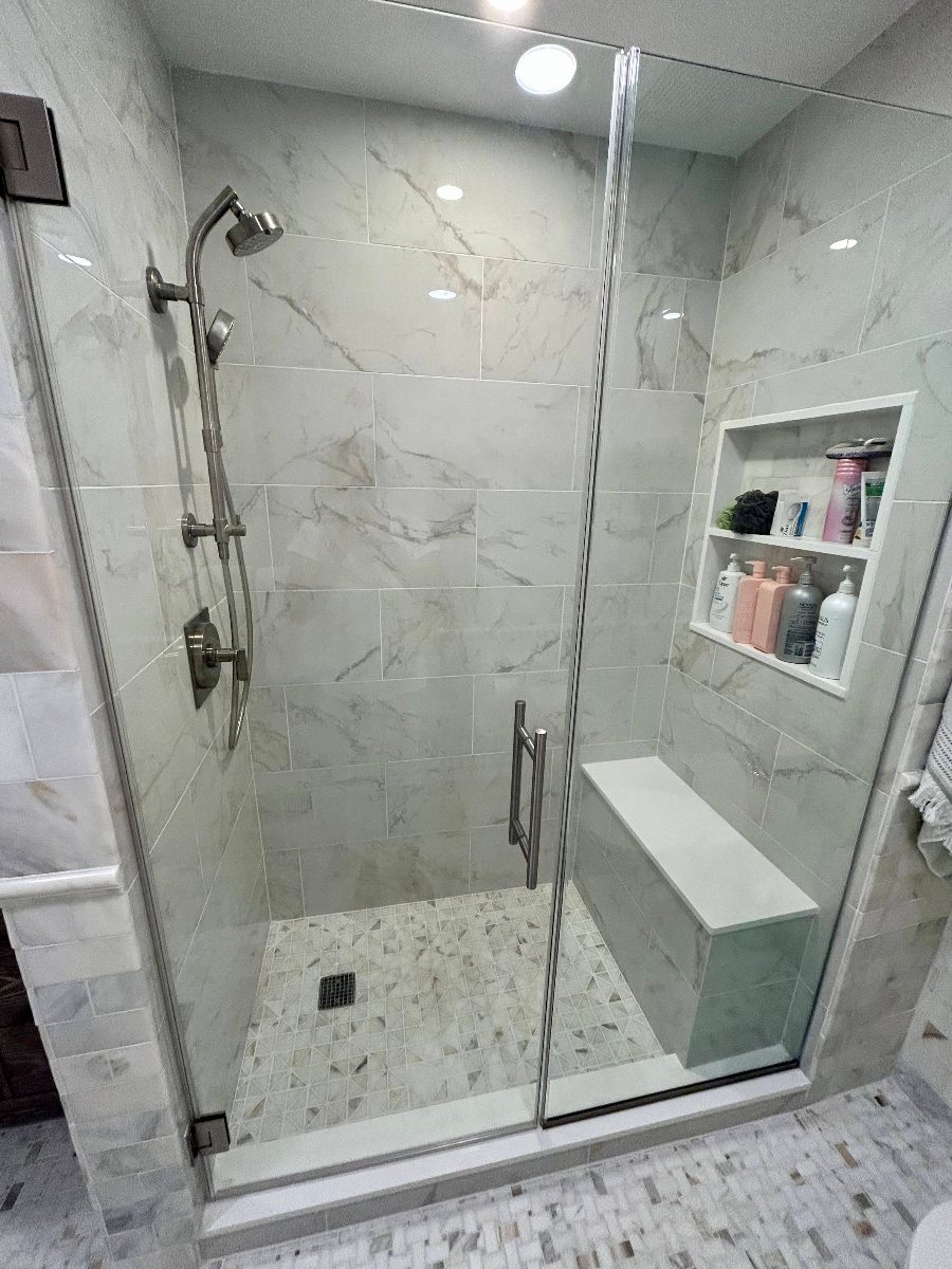 Bathroom renovation with marble tile shower