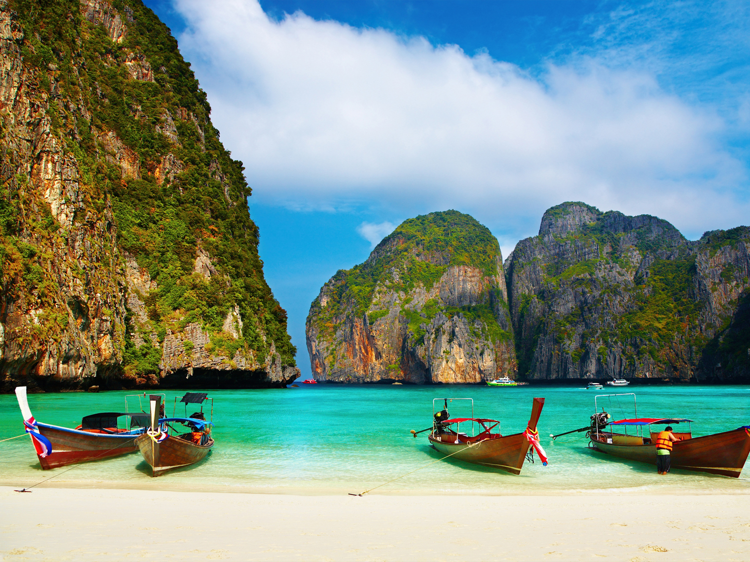 Limestone karsts and emerald waters define the Southeast Asian charter experience.