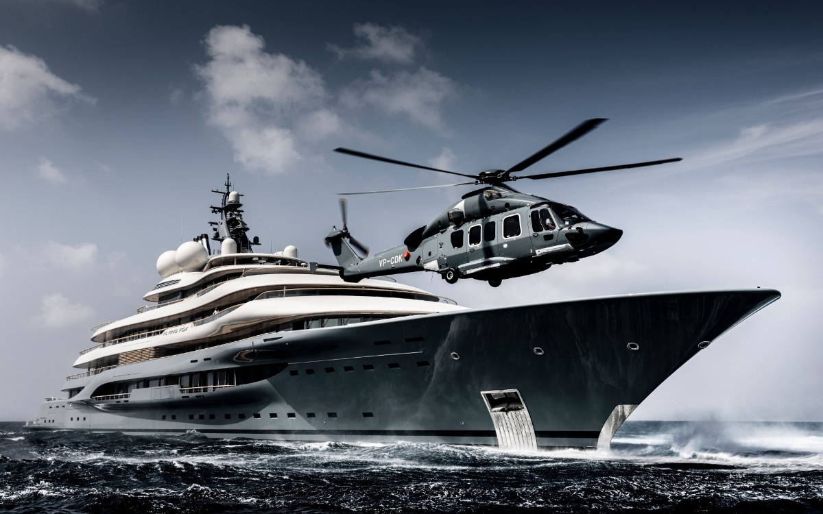 Luxury superyacht with helicopter