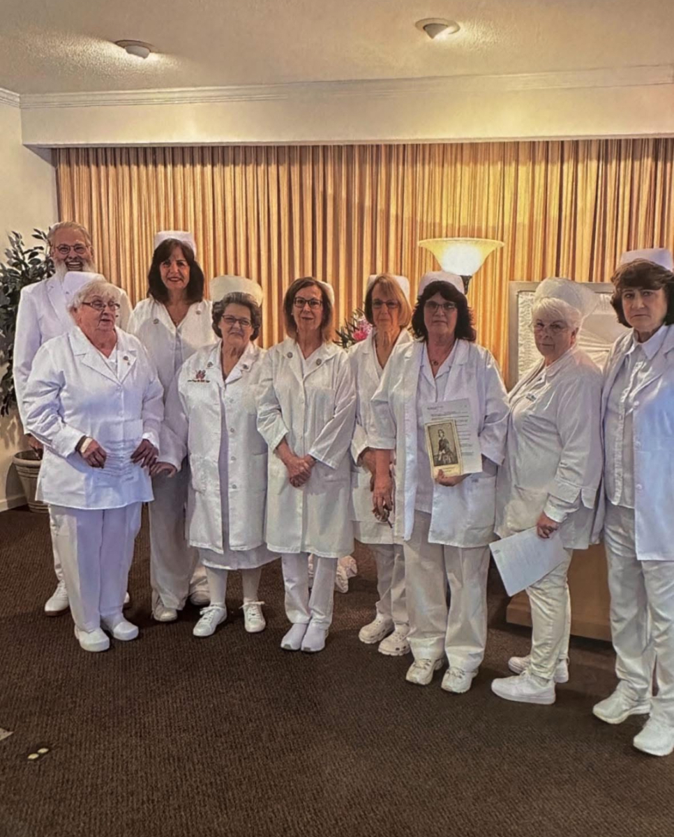 Michiana Nursing Honor Guard team members in formal white uniforms