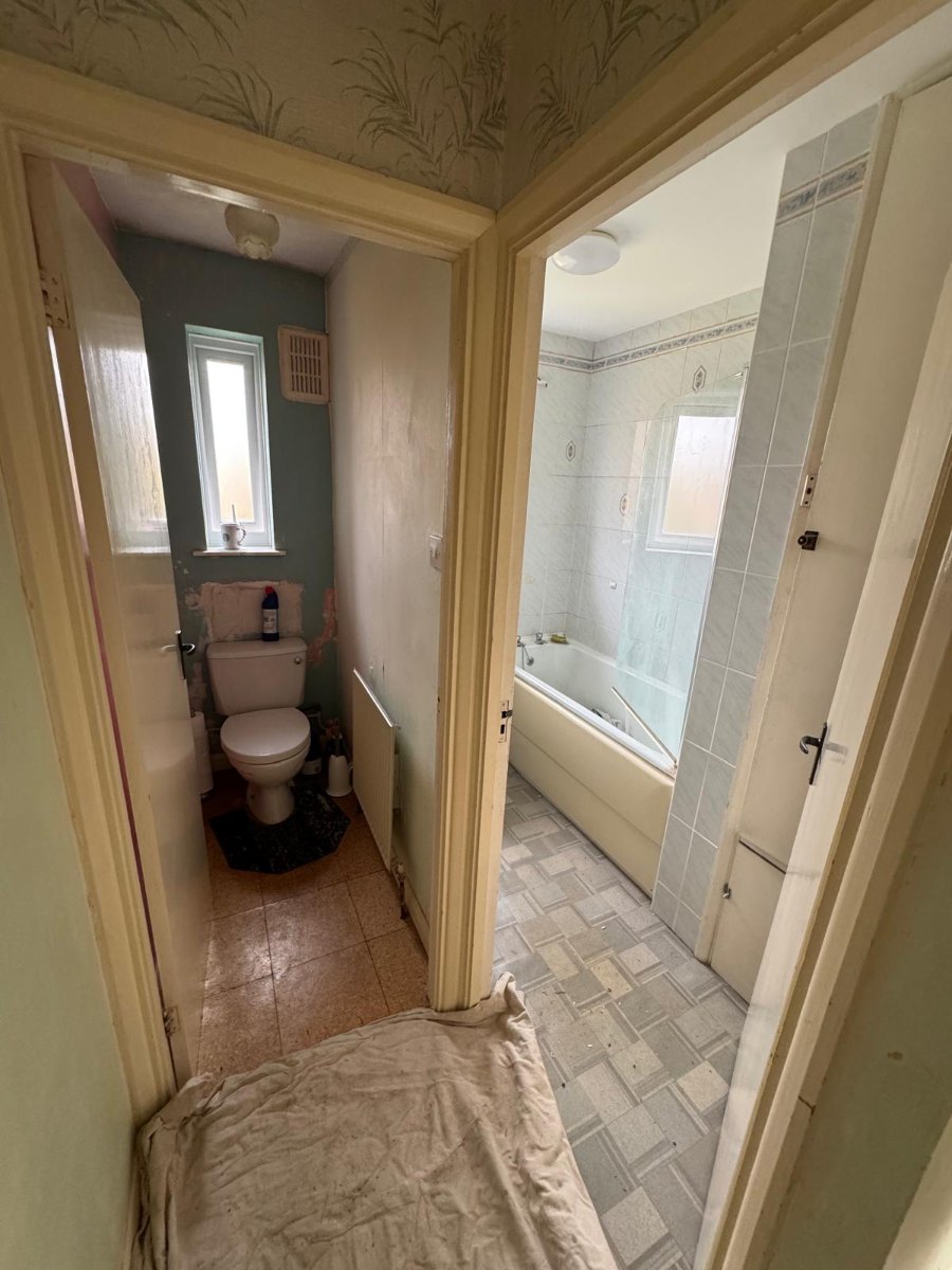 Original bathroom layout before renovation in Goring