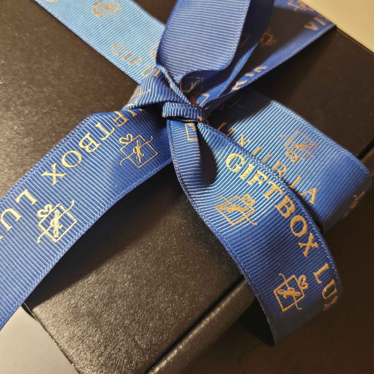 Okura Nougat collection display with UV-branded packaging - bespoke corporate gifting confections with DDP logistics worldwide