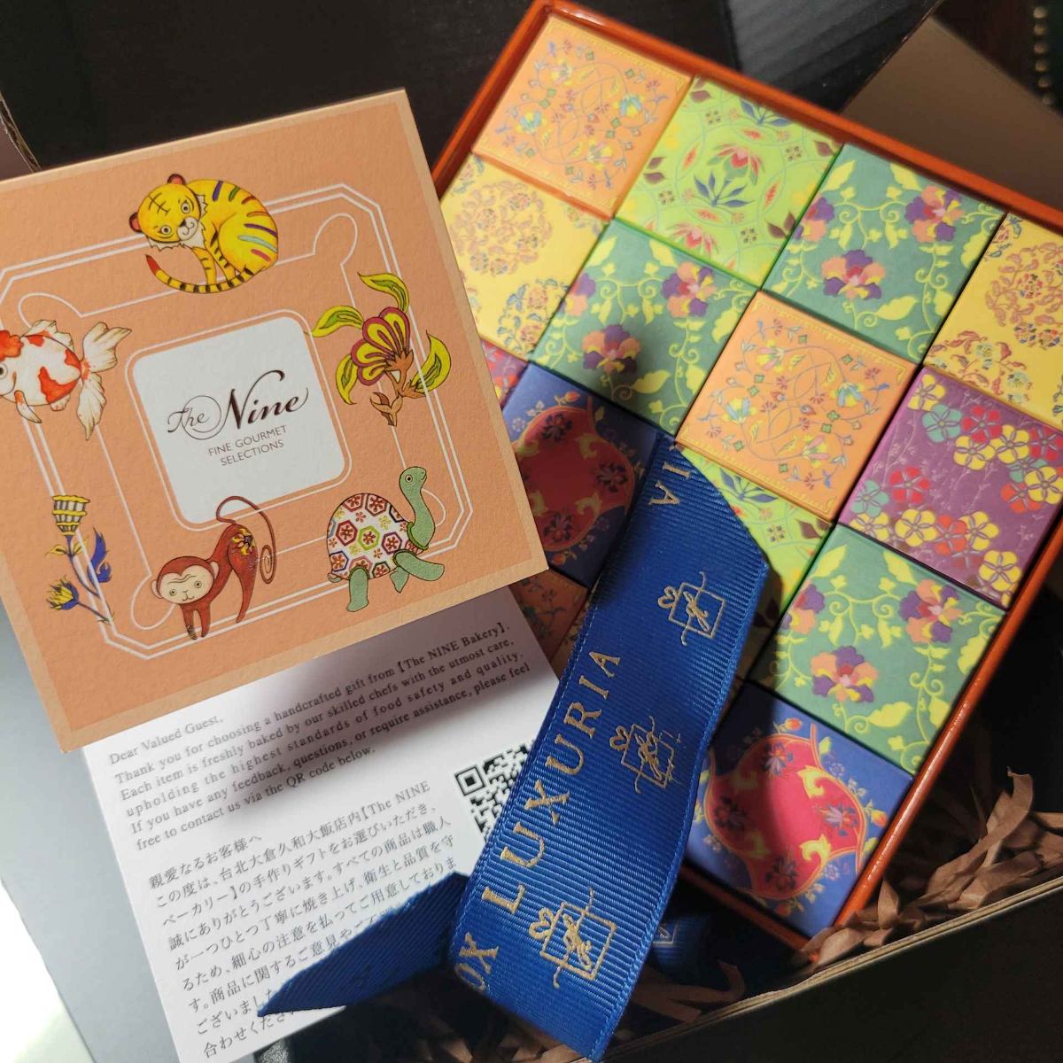 Premium Okura Nougat tower with UV-branded packaging - boutique gifting studio multi-tier confection for executive corporate gifting