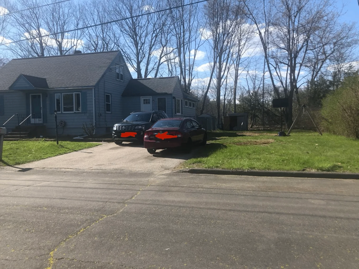 Before: Old cracked driveway — full driveway replacement by Unique Asphalt Paving