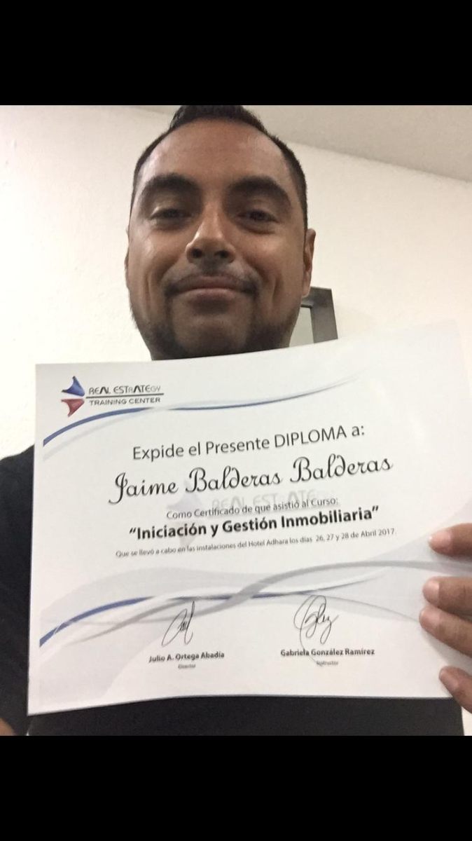 Jaime Balderas with diploma