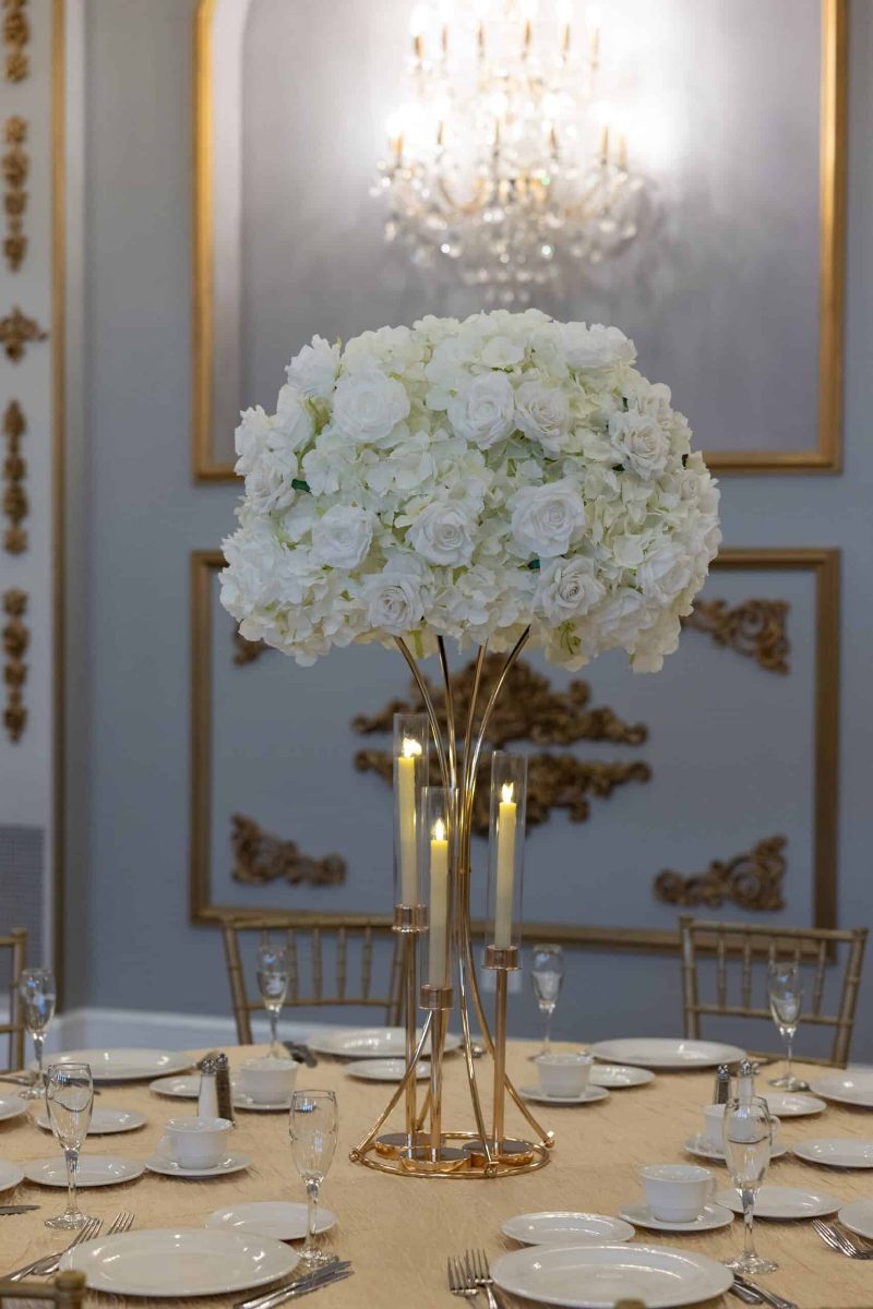 White Hydrangea and Rose On Gold Hourglass Stand & Gold Taper Candle Holders