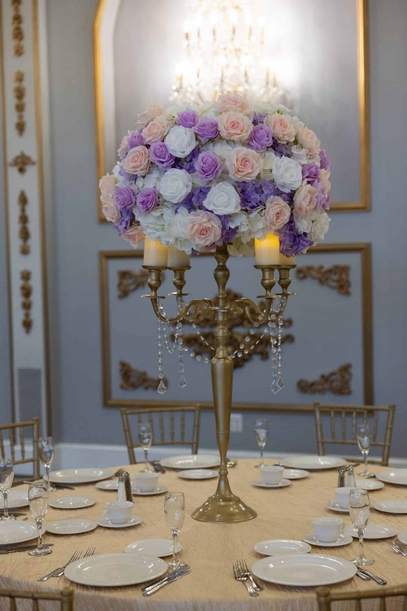 White Hydrangea with white, pink and lavender roses on Gold Candelabra
