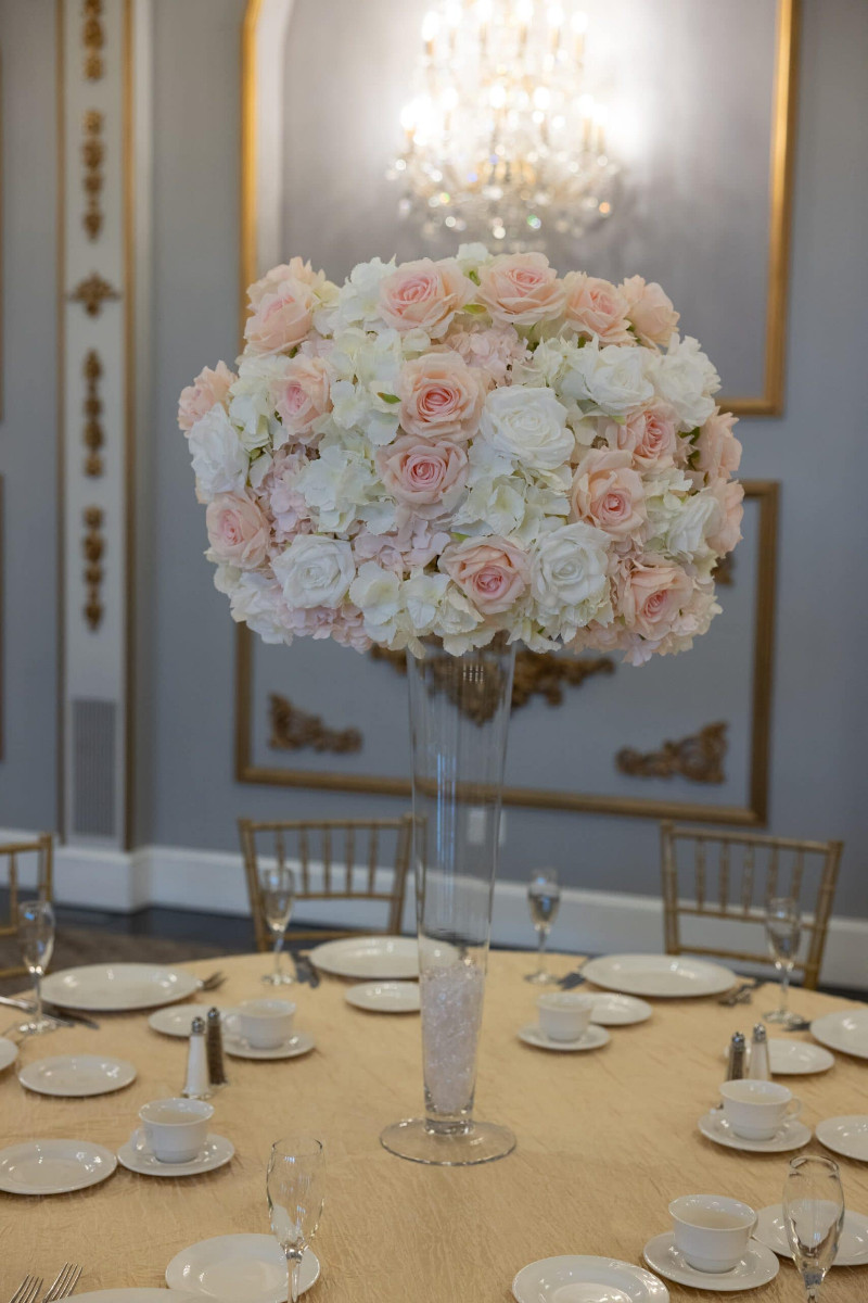 White Hydrangea with white and blush roses on Pilsner Vase