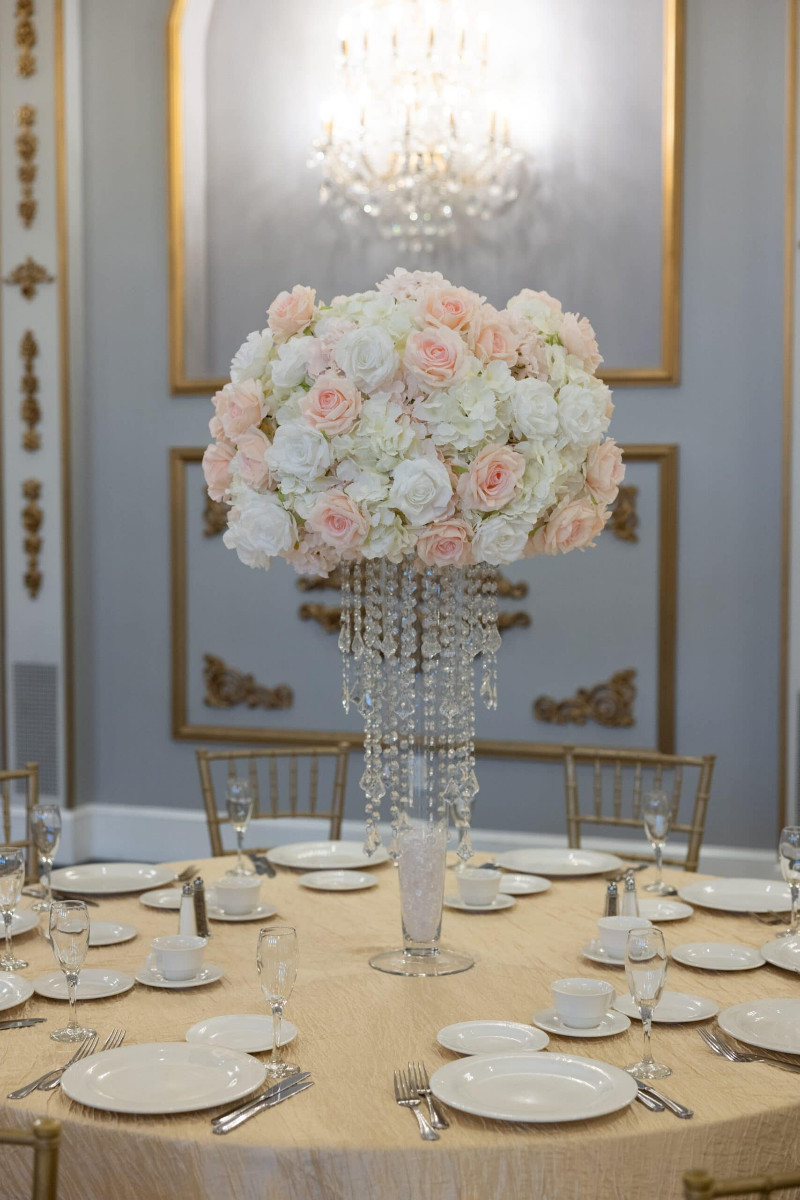 White Hydrangea with white and blush roses on Pilsner with Princess Chandlier