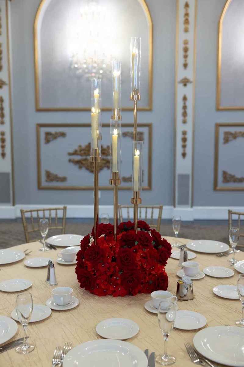 Gold Spiral Candelabra with red Hydrangea and rose arrangement