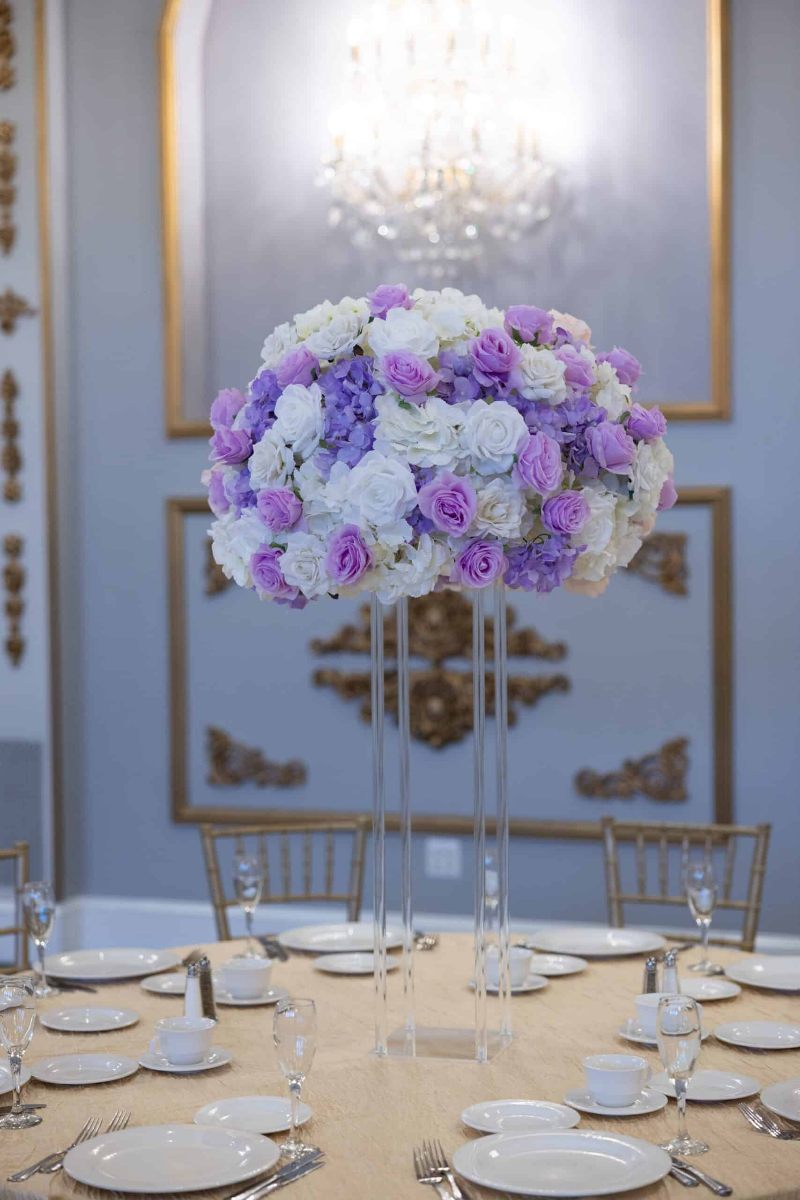 White Hydrangea and White and Lavender roses on Clear Harlow Stand