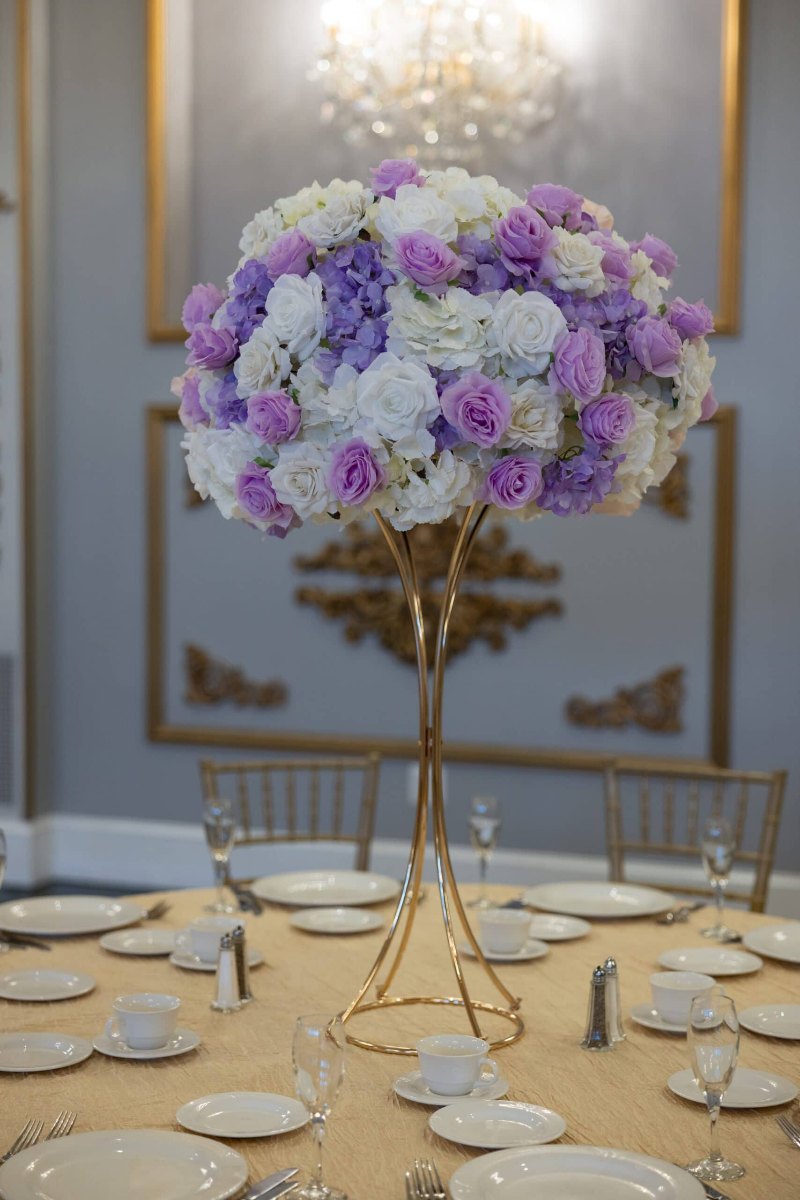 White Hydrangea and White and Lavender roses on Gold Hourglass stand