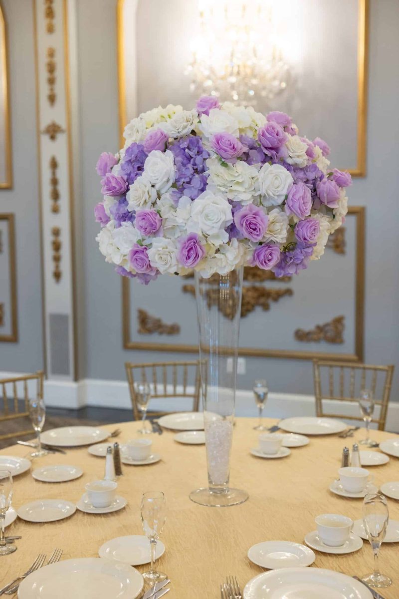 White Hydrangea and White and Lavender roses on Pilsner Vase
