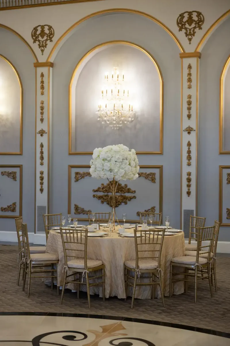 White Hydrangea and Rose on Gold Hourglass Stand