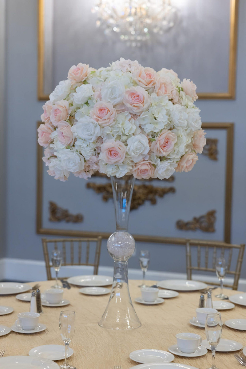 White Hydrangea with white and blush roses on Hourglass Vase