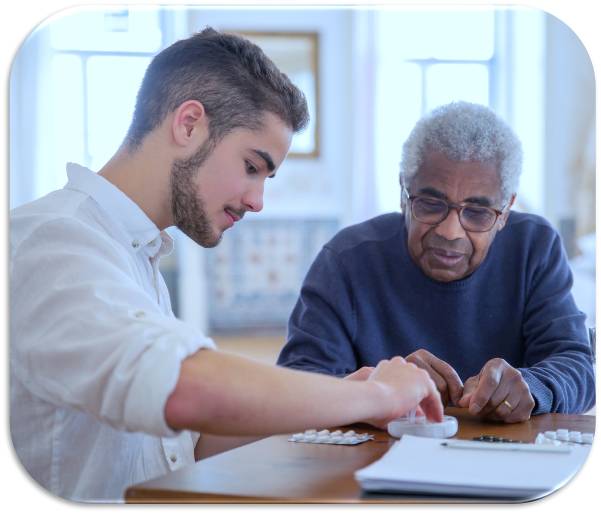 Compassionate home carer supporting elderly client