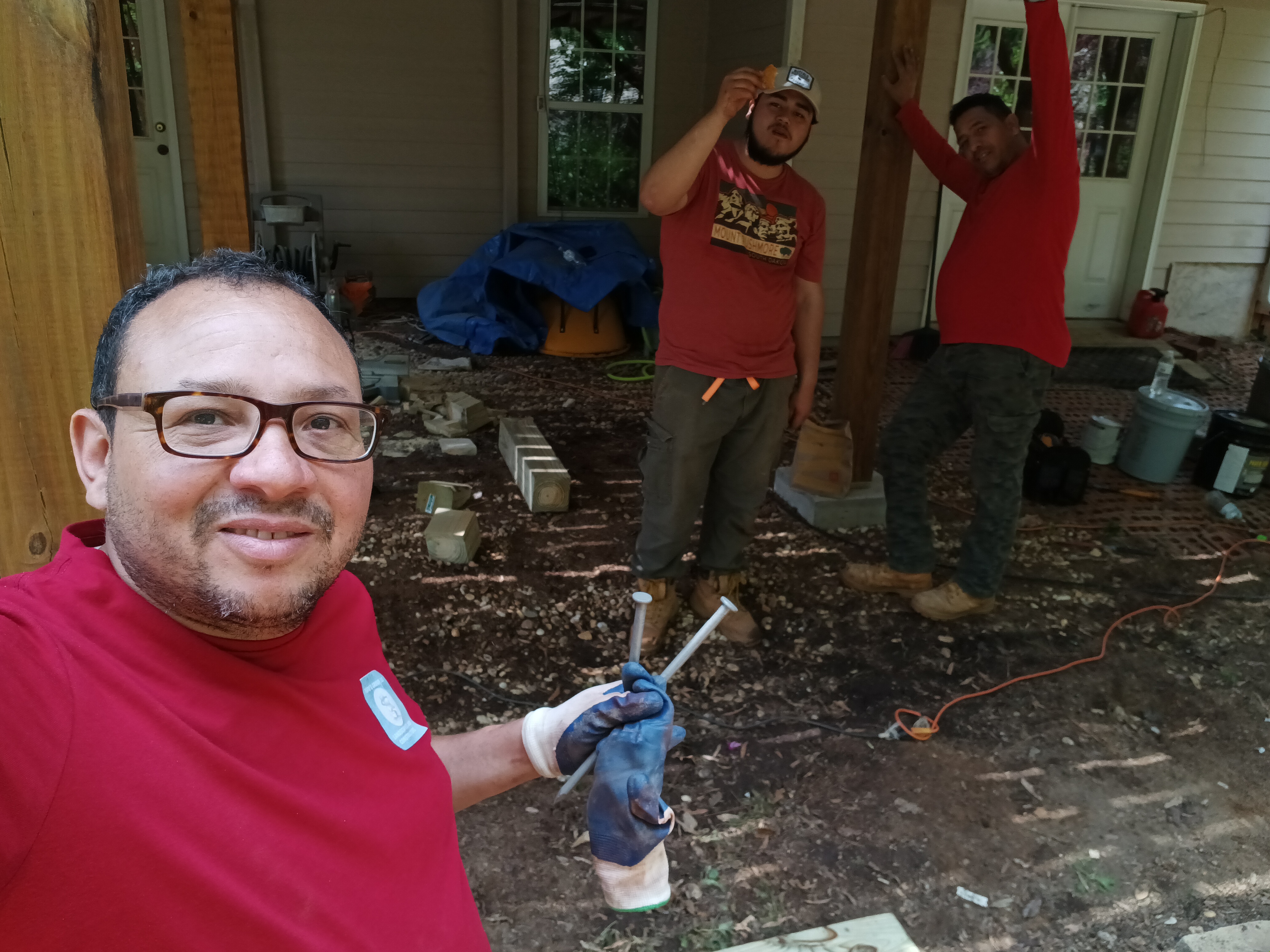 TOPOS GROUP professional landscaping and construction team working on residential property