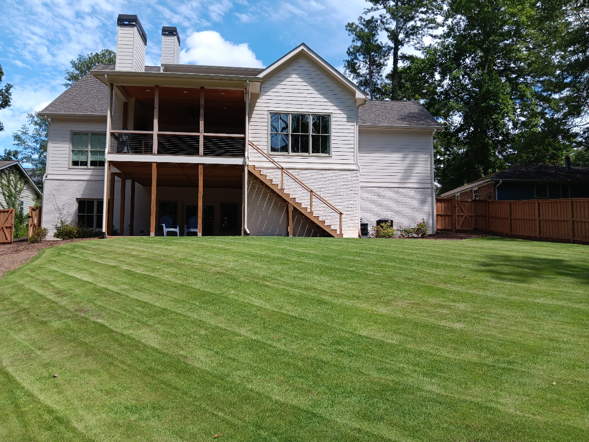 Professional landscaping and construction services transforming residential properties in Woodstock Georgia