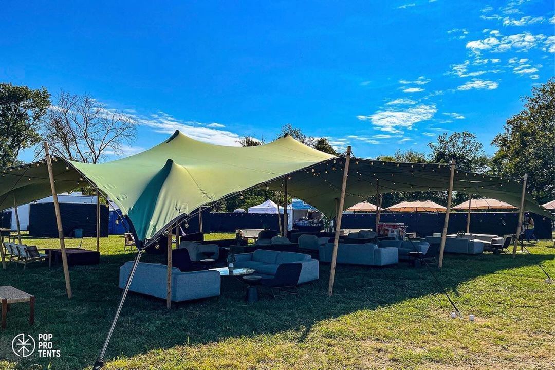VIP cocktail reception under stretch tent