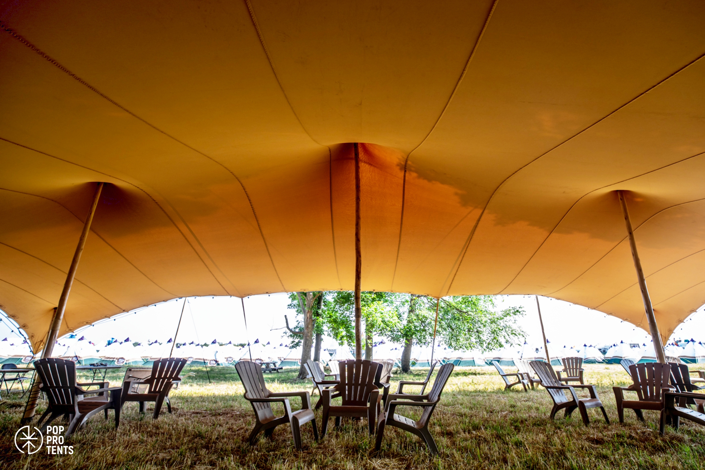 Street food market under stretch tent