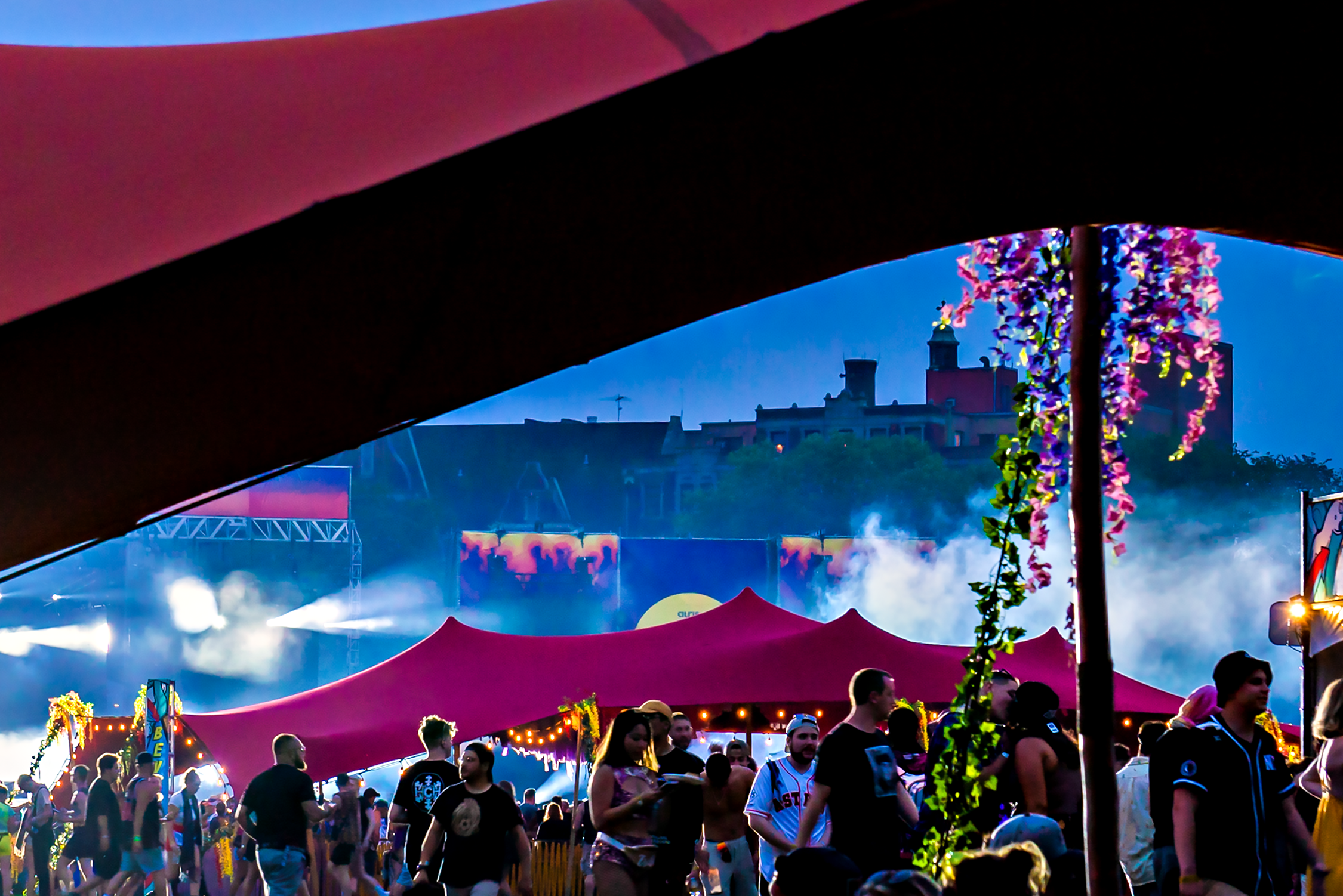 Pop Pro Tents stretch tent illuminated at a festival