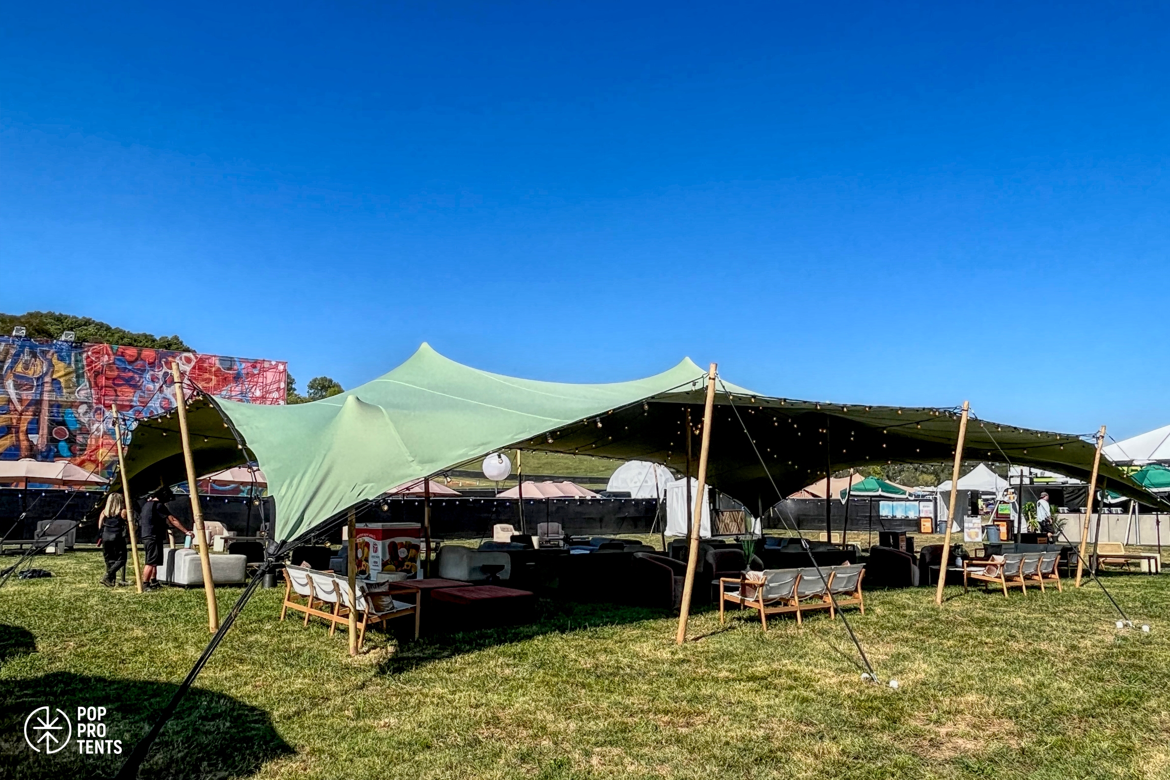 Private anniversary dinner under stretch tent