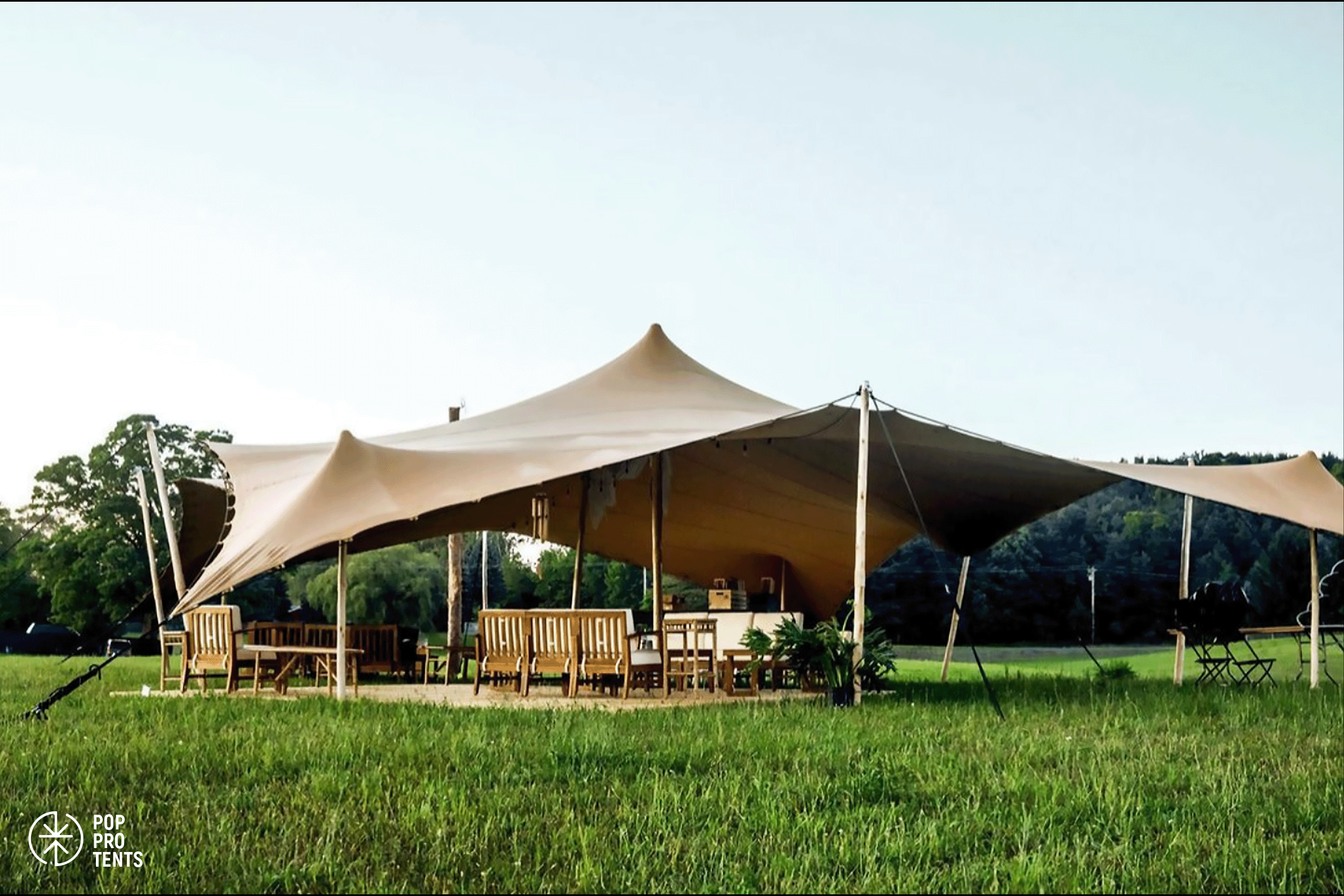 Charity gala fundraiser under stretch tent