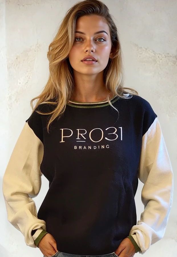Team Apparel - Two tone sweaters with on-brand trim and embroidered chest area. Classic and timeless. Custom knitwear by Pro31 Branding for sweaters applications