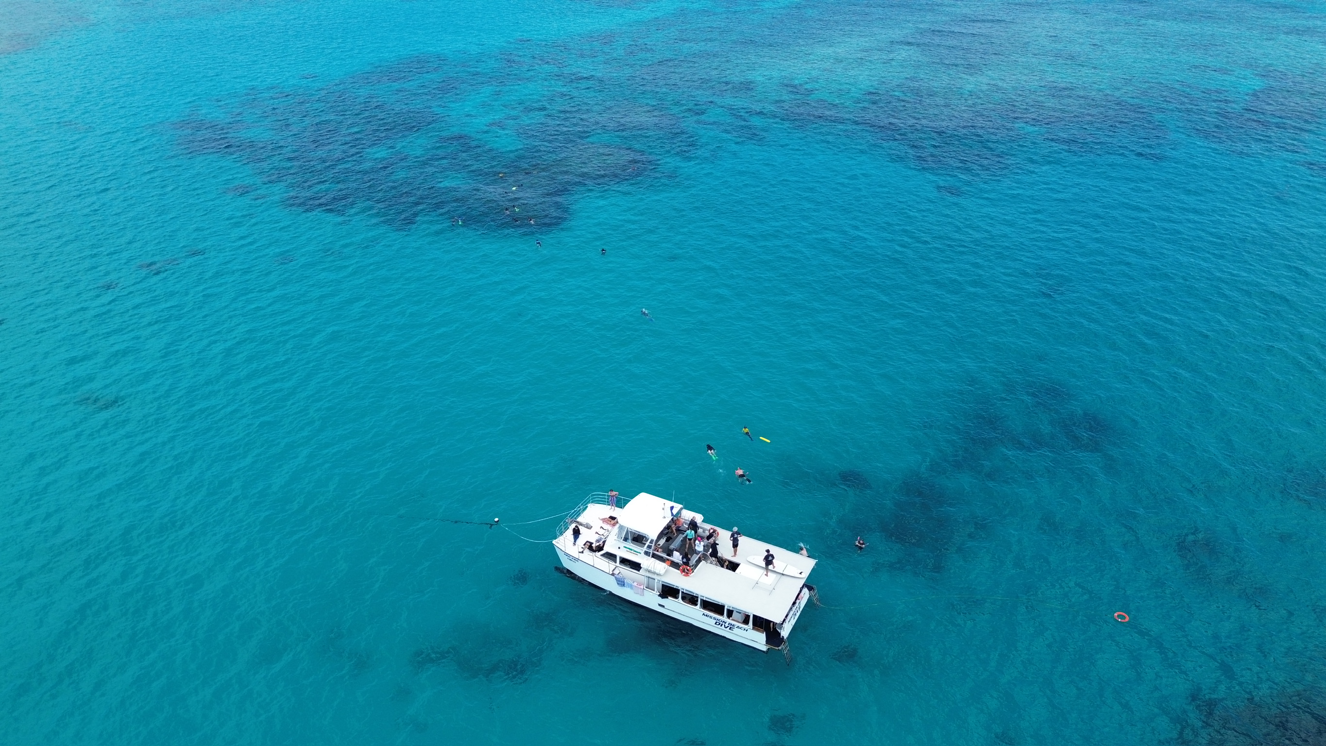 Divers exploring the Great Barrier Reef