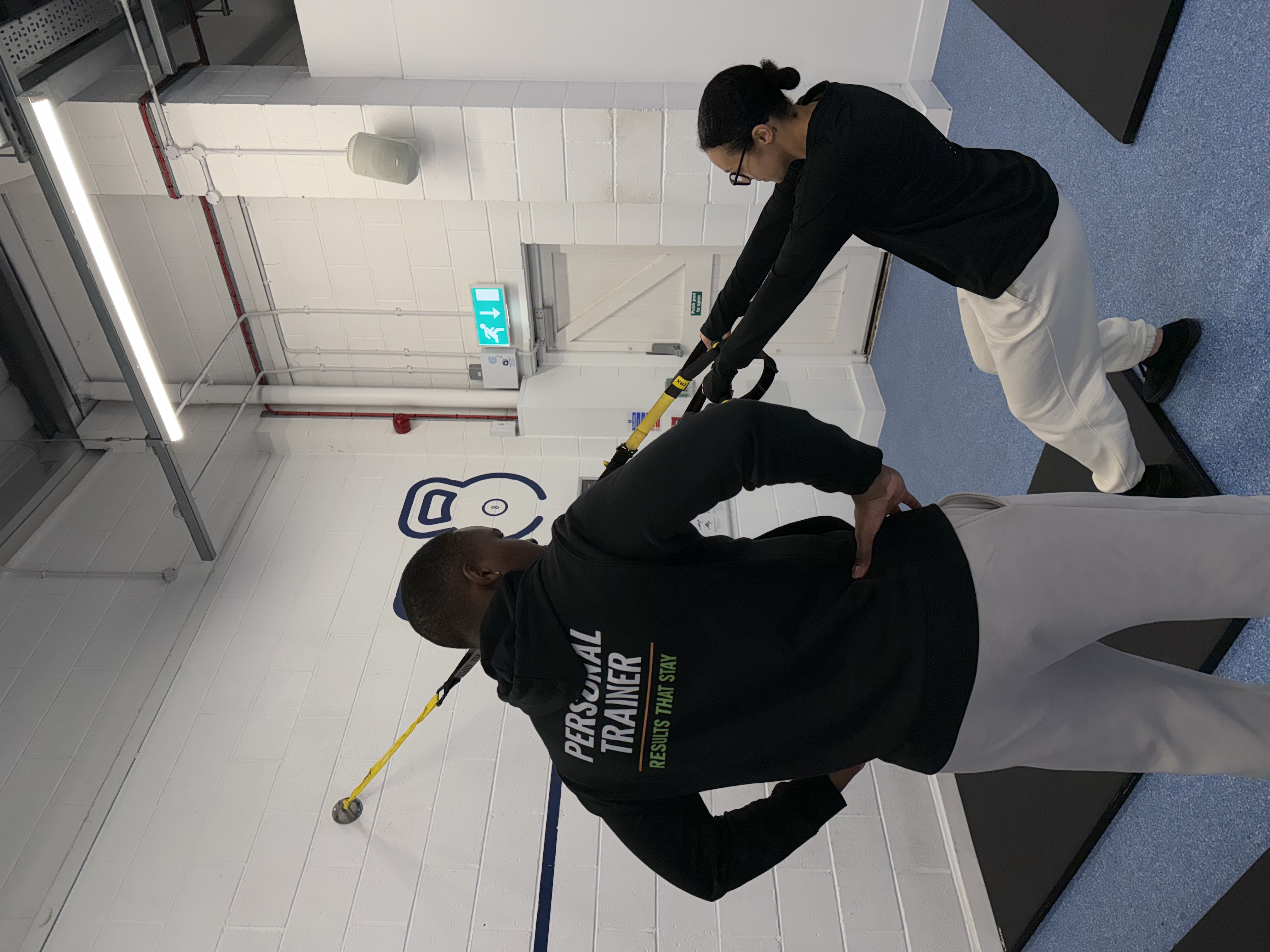 Functional coaching showing controlled movement