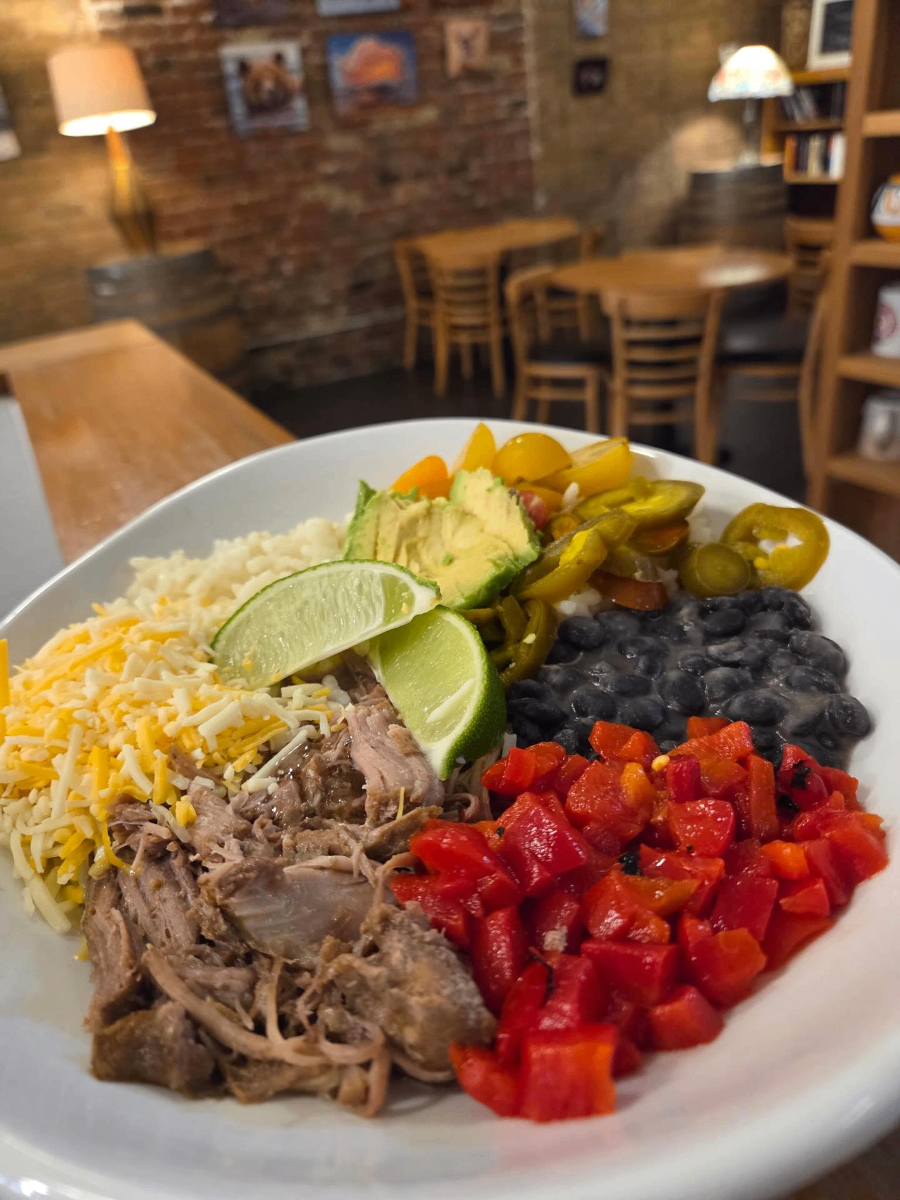 Burrito bowl with pulled pork and fresh toppings