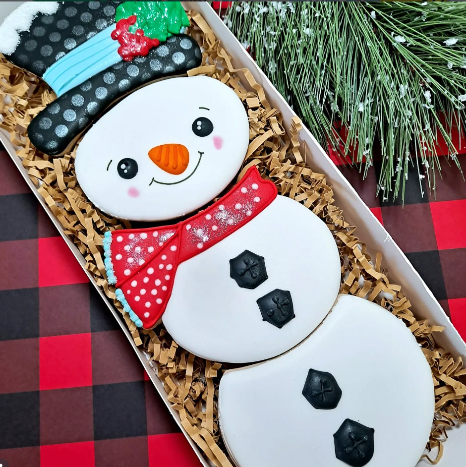 Snowman cookie set with festive decorations