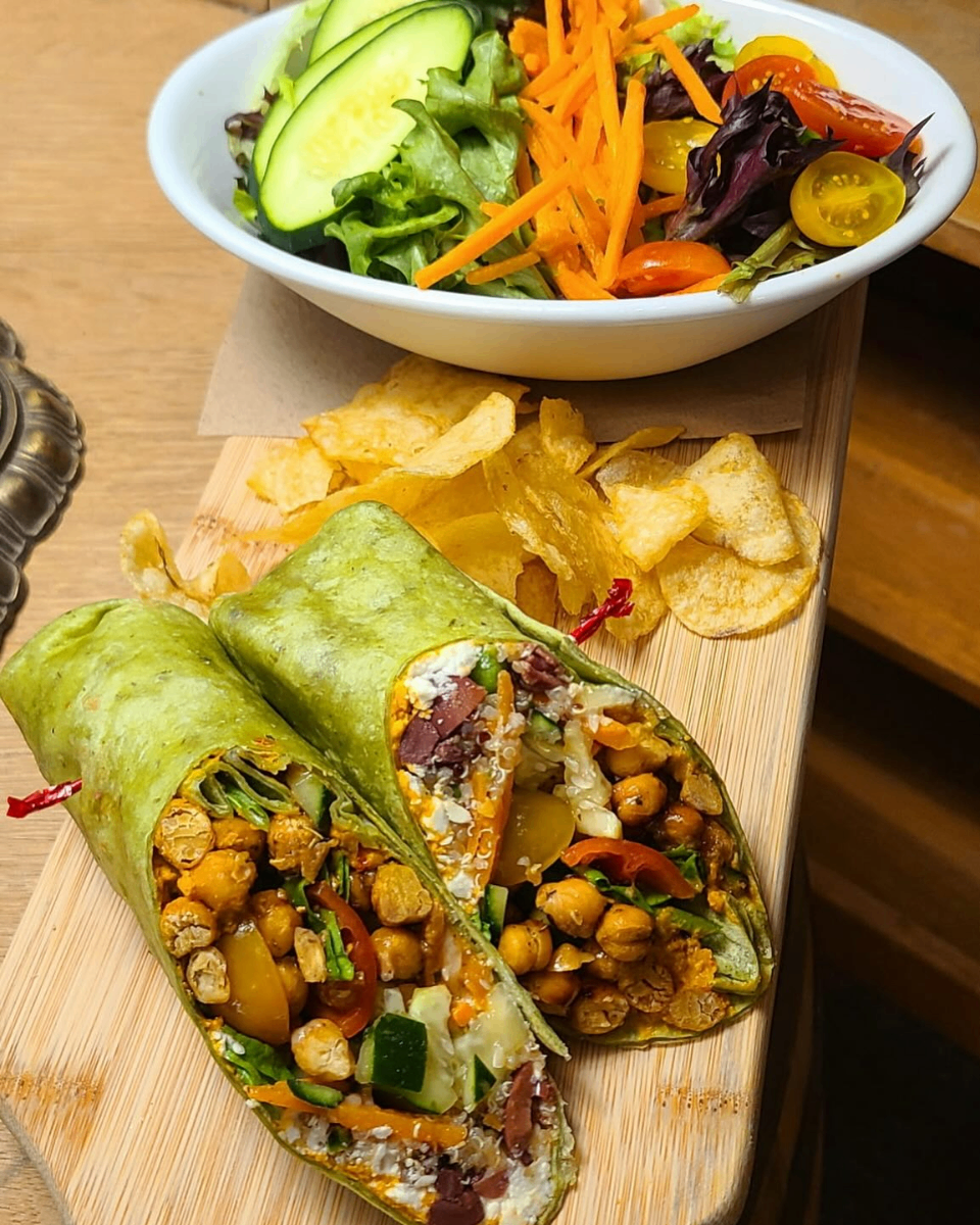 Wrap with chickpeas, vegetables, and chips