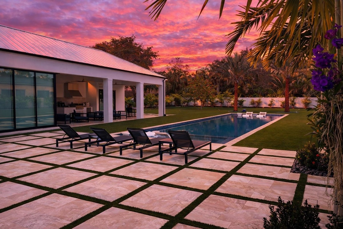 South Florida luxury estate pool at sunset