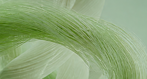 Soft flowing bamboo-blend fibers with a gentle green and cream sheen